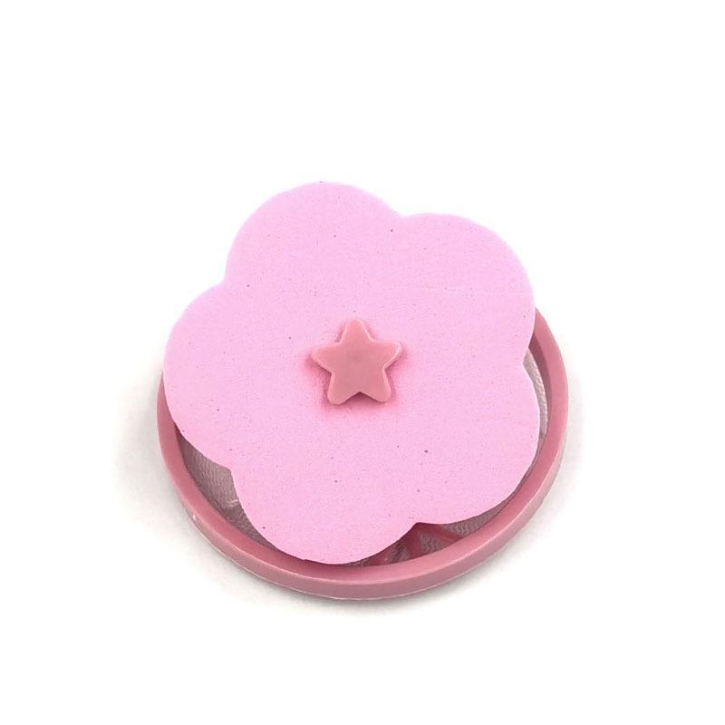 This Washing Machine Features A Cute Flower-Shaped Lint Collector With A Fine Mesh Design, Perfect For Everyday Laundry.