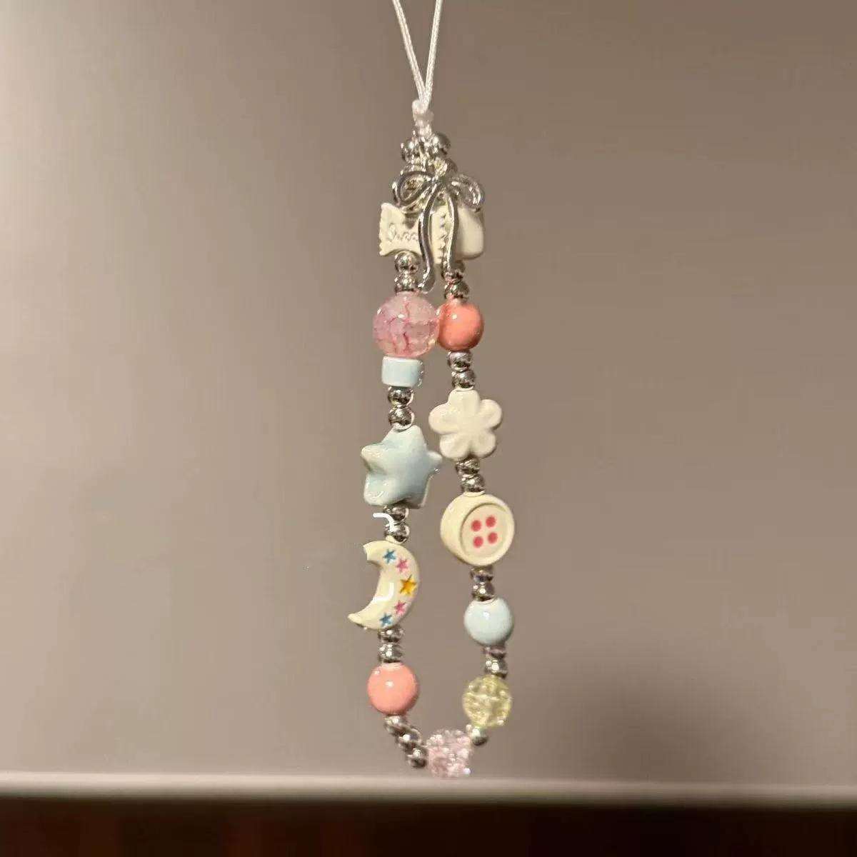 

Мультяшный жемчужный бантик, шнурок для телефона, защита от потери, съемный, брелок для телефона в виде сердечка, бабочки, цепочка для телефона, ремешок на запястье