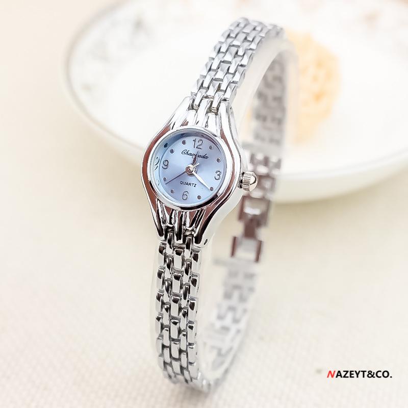 Reloj de pulsera de estilo coreano para estudiantes: bonito reloj de cuarzo con correa fina para damas.
