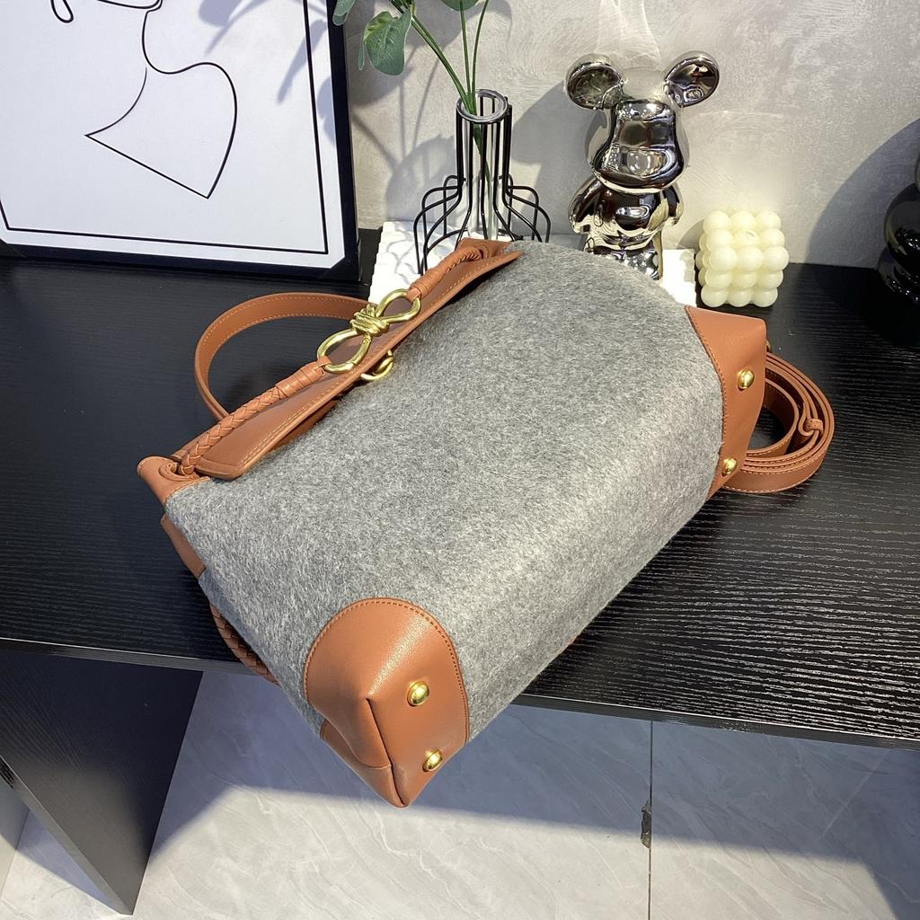 Bolsa de mão de lã de alta qualidade transfronteiriça feminina 2026 nova bolsa tote com fivela de laço bolsa de ombro mensageiro
