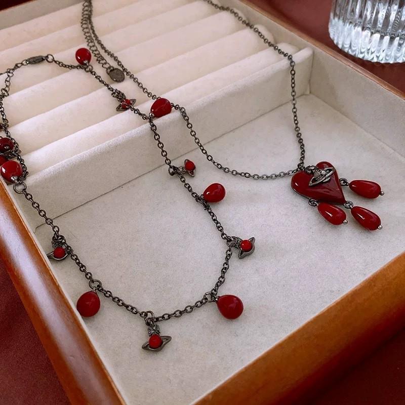 Kaiserin Cixi Angkorrot Quastenkette: Elegante Pulloverkette für Damen