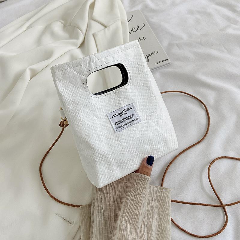 

Mini messenger small bag women s popular new trend shoulder bag niche fashion versatile mobile phone bag 15*5*18cm білий