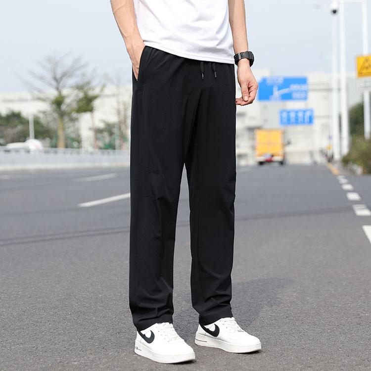 Li Ning Football Series Solid Color Ice Silk Lightweight Breathable Stretch Knitted Sports Pants Men Pants Black AYKS473-1
