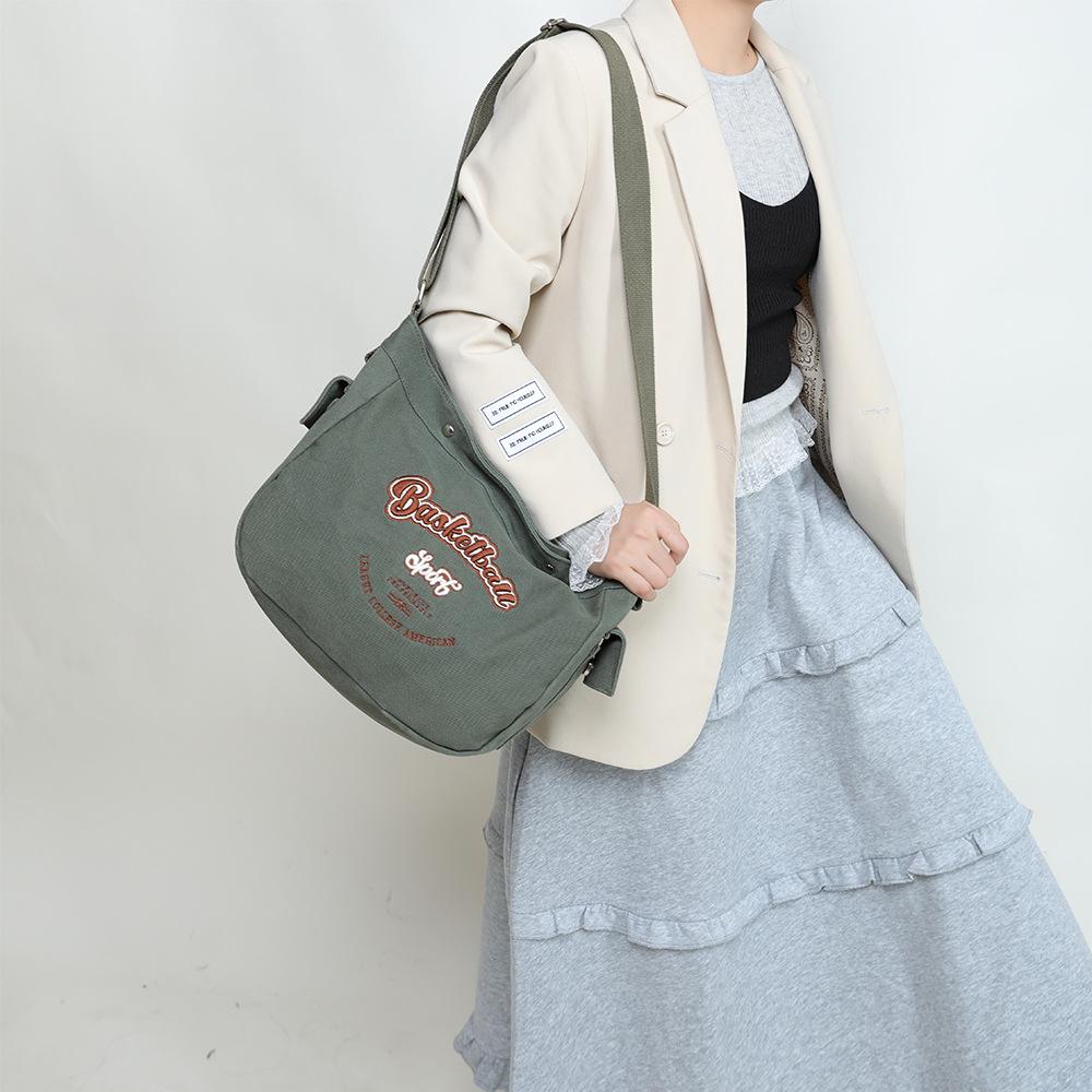 Korean Trendy Canvas Messenger Bag: Large Capacity for Women & Men, Sports Style