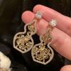 Zircon gourd hollow flower earrings light luxury high-end temperament stud earrings niche design earrings