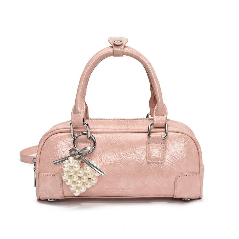 Korean niche simple portable bowling bag women 2025 new versatile foreign style fashion messenger pillow bag