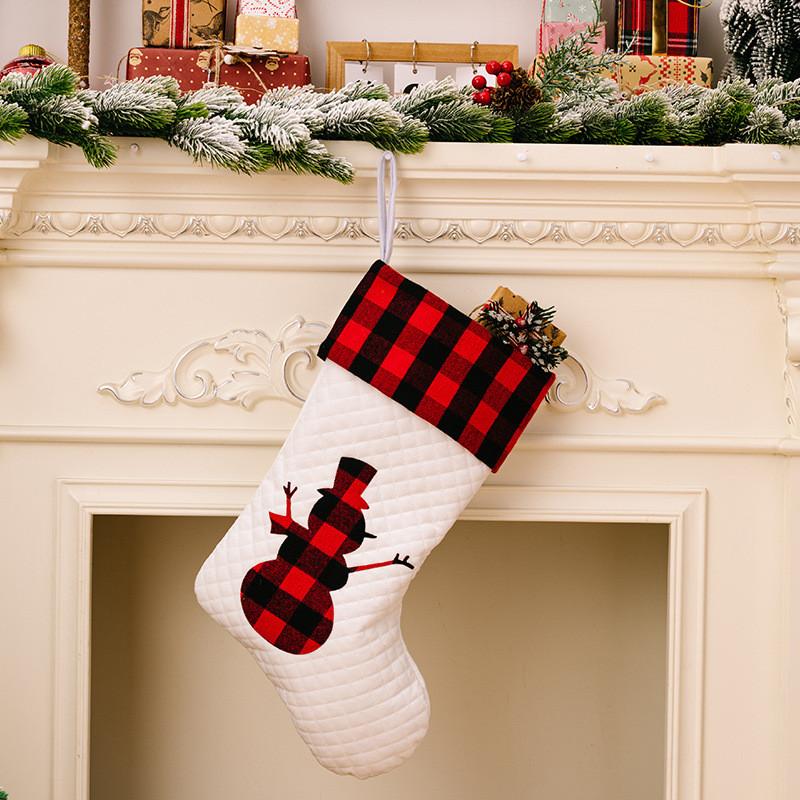

Elegant White Christmas Stockings With Red And Black Plaid Trim For Festive Decor White Snowman
