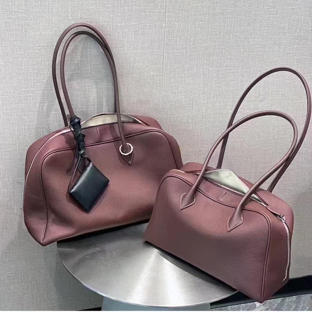 

Pillow bag 2026 new bowling bag leather shoulder underarm women s bag togo Boston bag women s large capacity 33x13x20cm