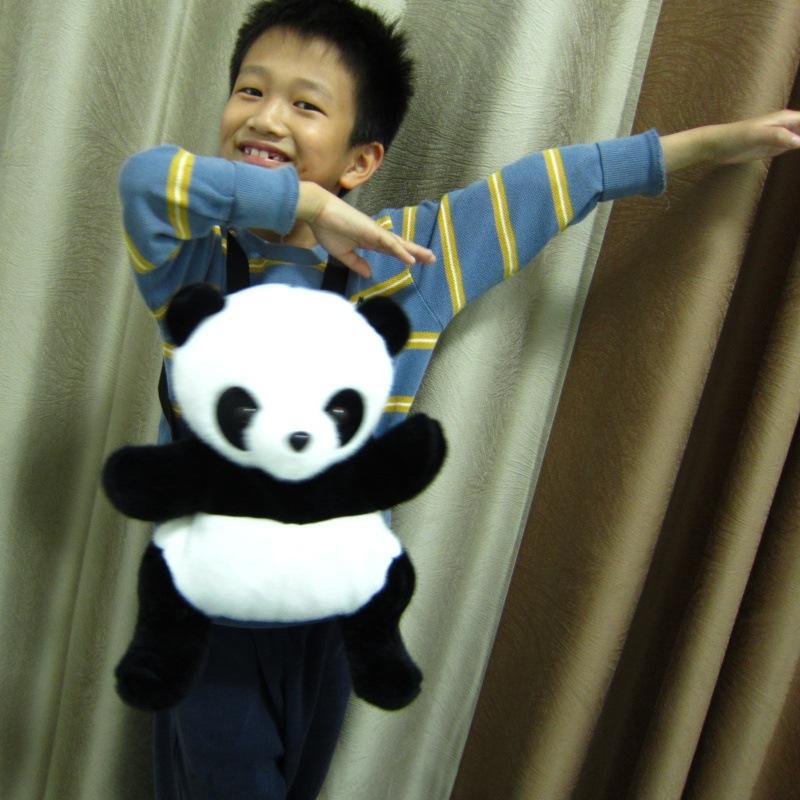 

Internet celebrity cute panda backpack messenger bag large capacity storage bag 61 children s day gift doll doll backpack length about 40cm