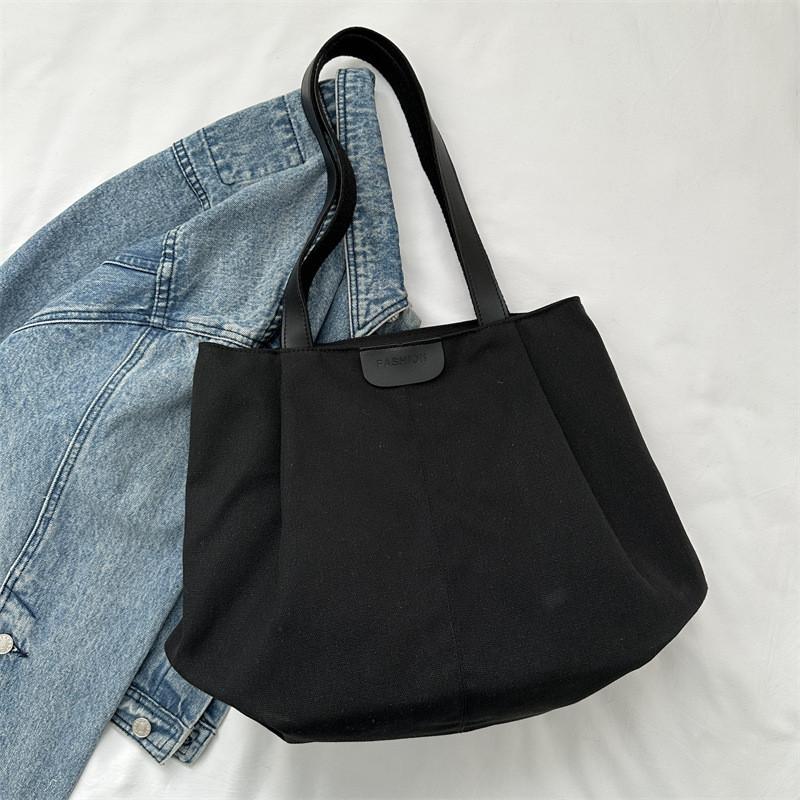 

Stylish Canvas Tote Bag For Women Perfect For College Commute With Large Capacity And Trendy Design