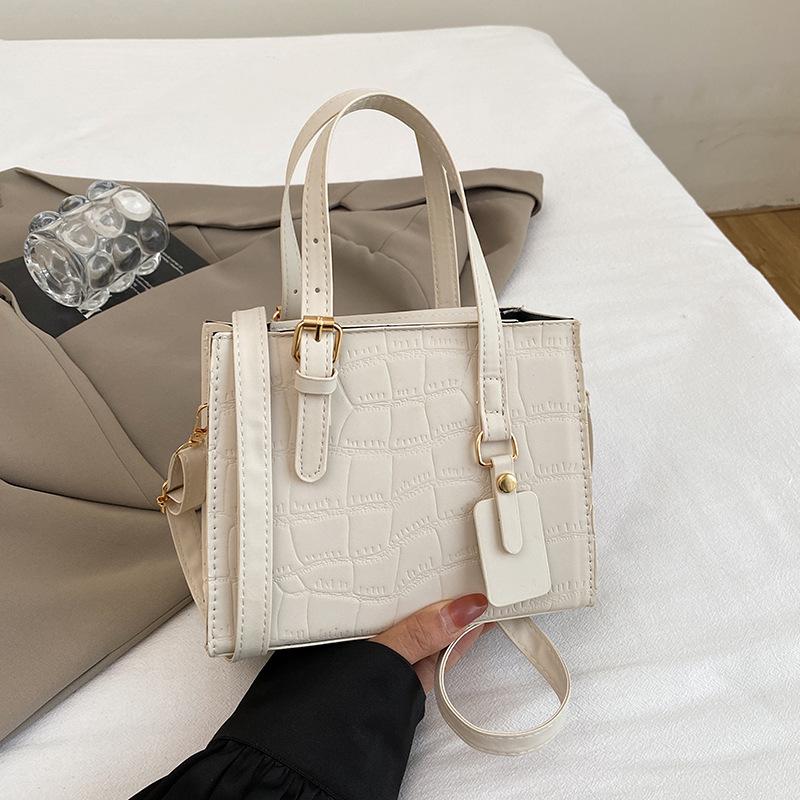 

Spring and summer new products versatile commuter atmosphere women s handbags popular high-end texture shoulder messenger bag білий