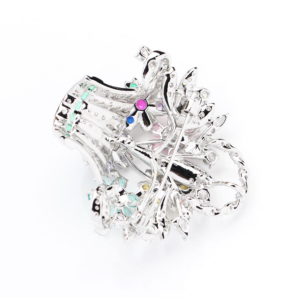 High-end French stone-inlaid color flower basket brooch flower cluster high-end light luxury flower pin accessories women's models