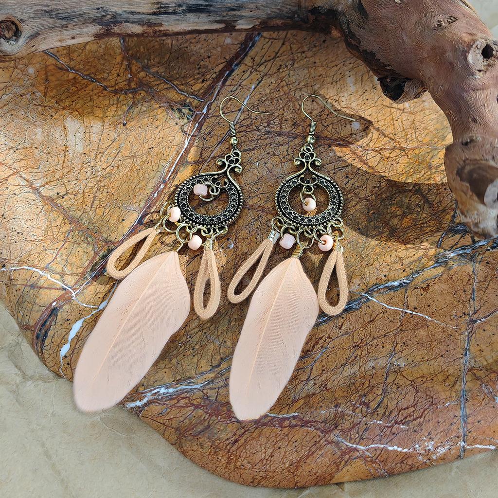 Retro ethnic style woven feathers long fringed earrings, bohemian high-end hollow rice bead earrings