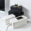 Desktop Power Strip Organizer Box with Anti-Shock Protection for Cords and Phone Storage.