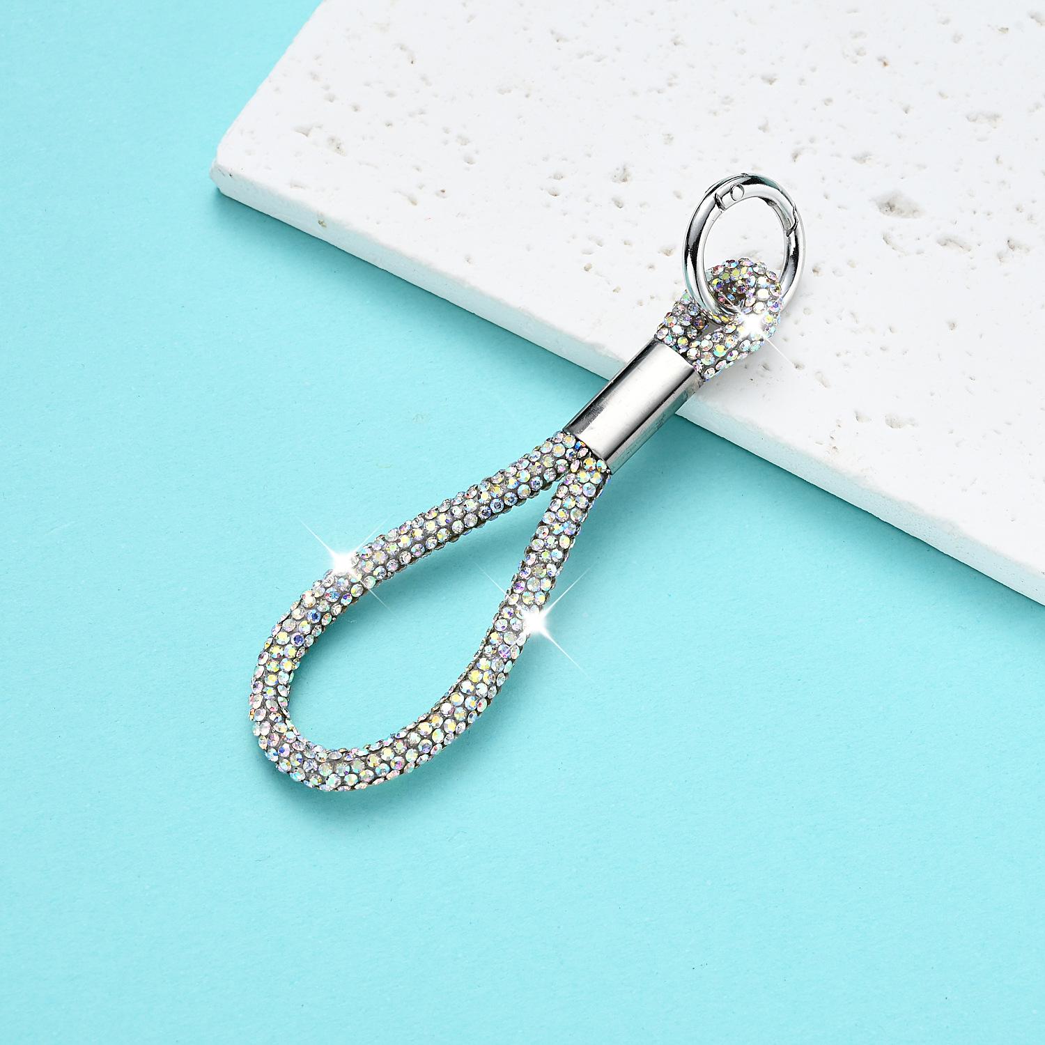 

Модный ремешок для телефона со стразами - Брелок с бриллиантовой подвеской против потери.