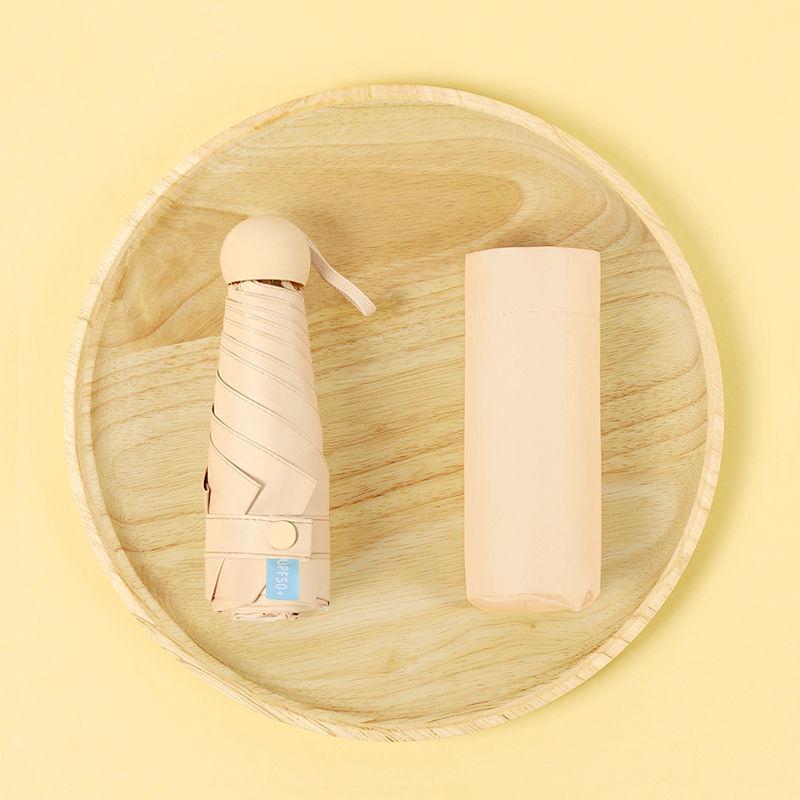 Parasol Capsule Sun Umbrella: 50% Off Mini UV Protection for Women, Dual-Purpose for Sun and Rain.