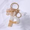 Chic White Tassel Letter Keychain with Resin Epoxy Pendant - Stylish Ornament for Bags