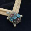 Vintage Distressed Turtle Brooch with Brass Rhinestone Flower - Women's Suit Pin Accessory