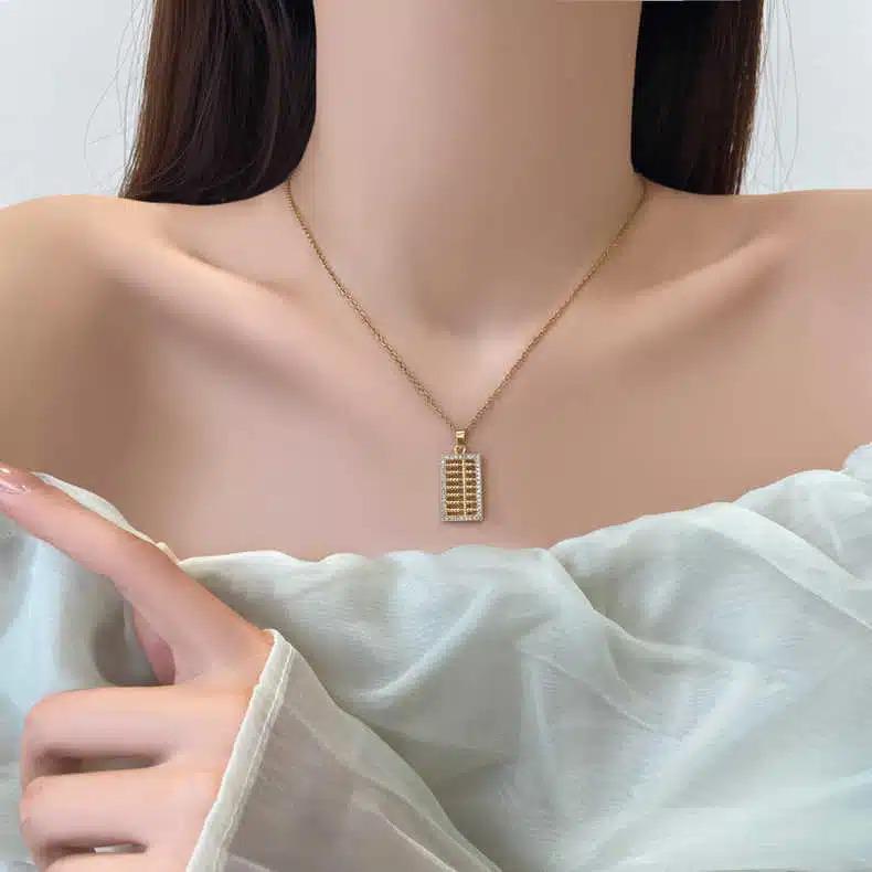 Yuxi's Elegant Ruyi Abacus Pendant Necklace: Trendy, Luxurious Clavicle Chain for Women & Girlfriends