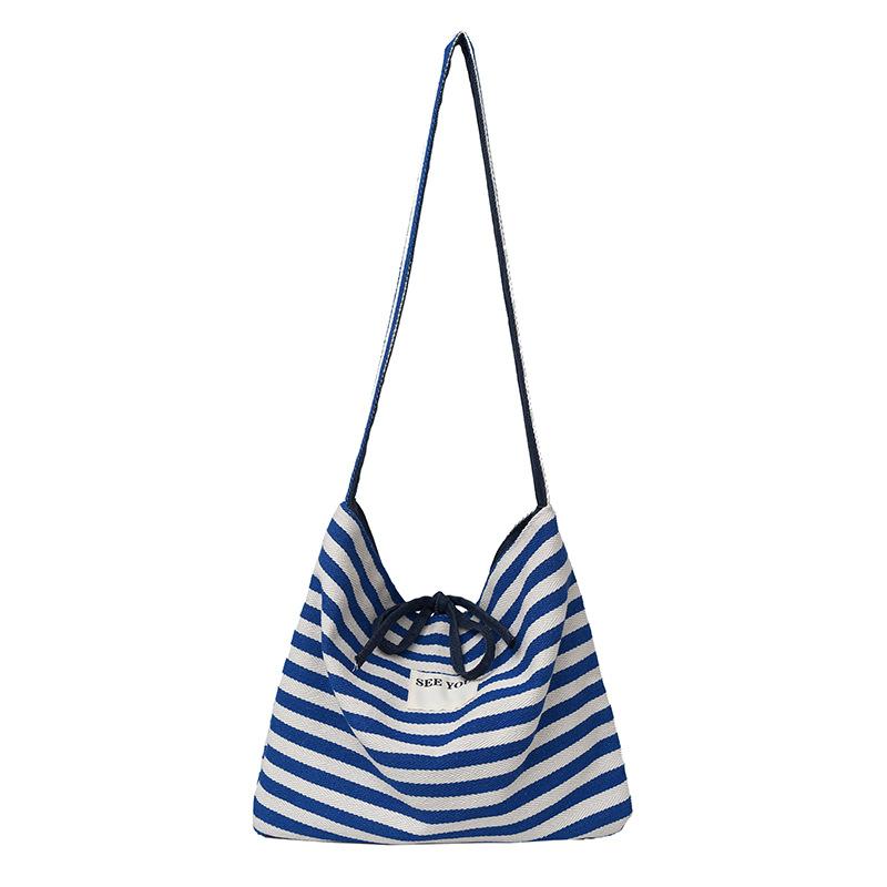 2025 new Korean casual lazy wind contrasting color striped tote bag large-capacity commuter versatile messenger women's bag