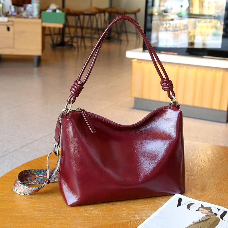 Genuine leather women's bag Korean version versatile first layer cowhide women's underarm wide shoulder strap single shoulder soft leather bucket bag