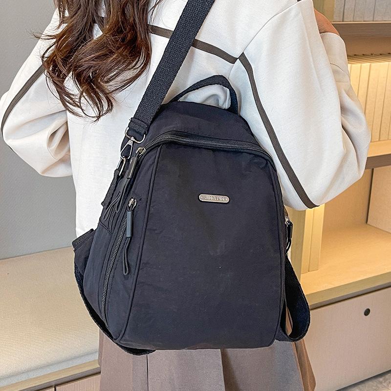 

Рюкзак большой вместимости Рюкзак Женский модный повседневный универсальный дорожный рюкзак Студенческий рюкзак для поездок Универсальная легкая наплечная сумка чёрный