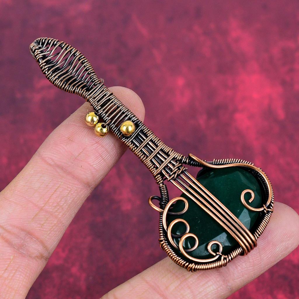 Faceted zambian emerald pendant copper wire wrapped pendant gemstone copper jewelry handmade guitar pendant wire wrap jewelry gifts for him