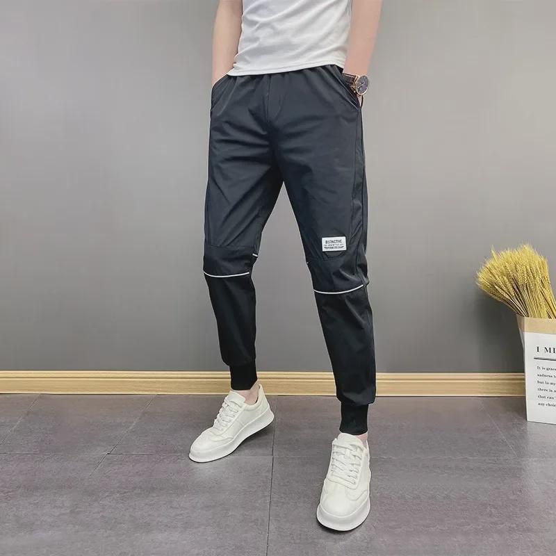 

Мужские свободные комбинезоны-шаровары весна/лето - большие размеры, корейские повседневные брюки M чёрный