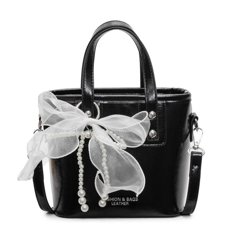 

Fashion niche design hand bucket bag women s new simple and versatile shoulder bag trendy messenger bag чёрный