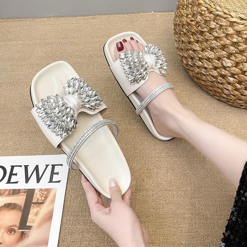 2025 summer new rhinestone bow cool slippers women's summer wear versatile skirt French flat slippers