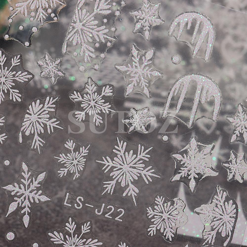 Winterweiße Weihnachts-Nagelsticker: Glitzernde Schneeflocken-, Herz- und Rentierdesigns