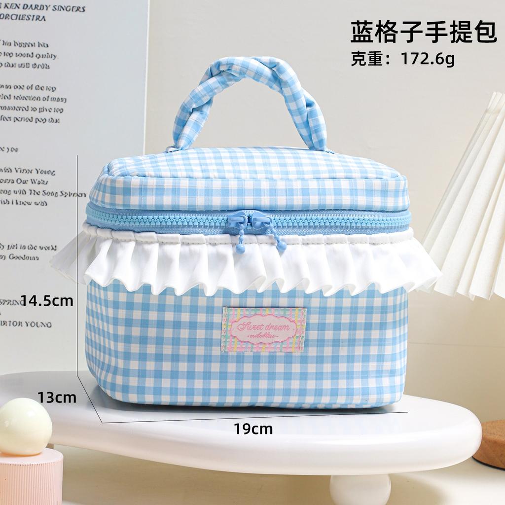 Korean-style niche design twisted handle makeup bag with large capacity pleated lace storage bag, color-blocked plaid wash bag.
