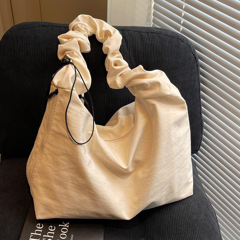 Canvas bag women's large capacity 2025 new spring and summer versatile shoulder messenger bag cloth bag pleated class tote bag