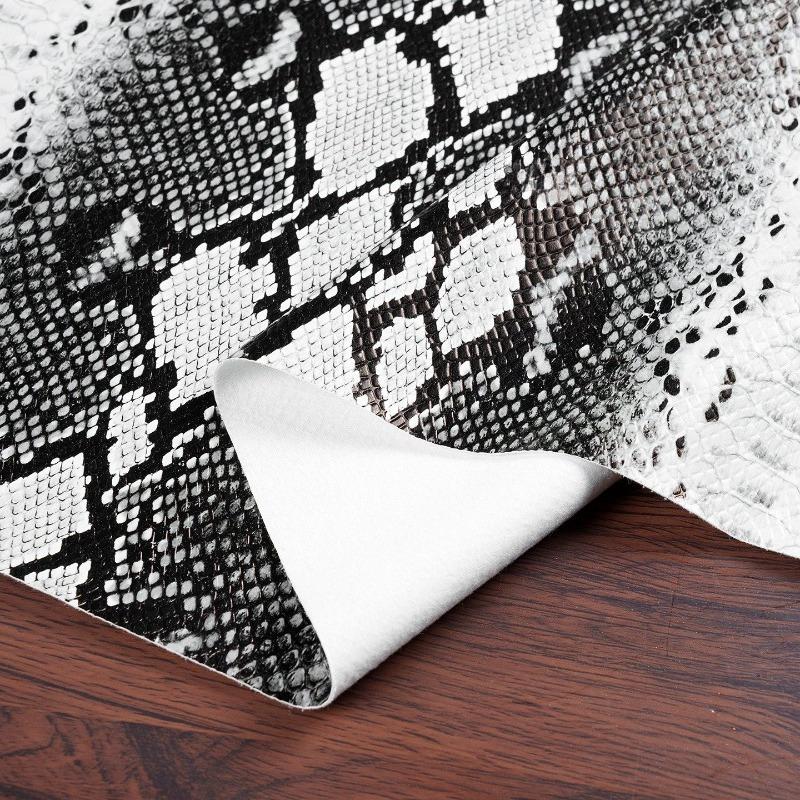 Tessuto in Pelle con Fantasia Serpente Bianco/Nero per Cucire Pantaloni a Gamba Larga Gonna in Pelle Tessuto Elastico Goffrato Tridimensionale