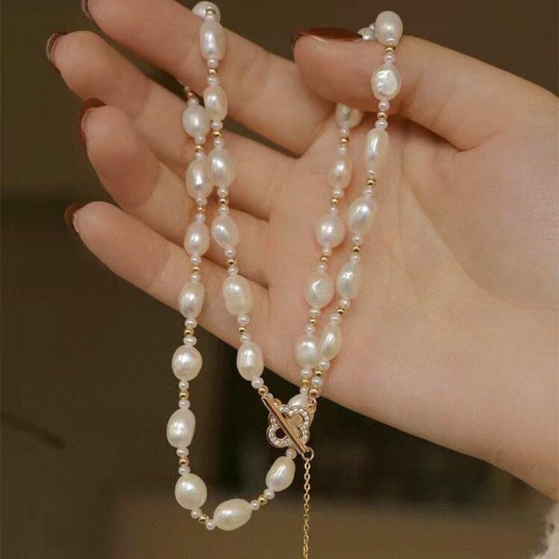 Korean natural Baroque pearl necklace INS niche light luxury design 11k gold inlaid four-leaf clover collarbone chain for women
