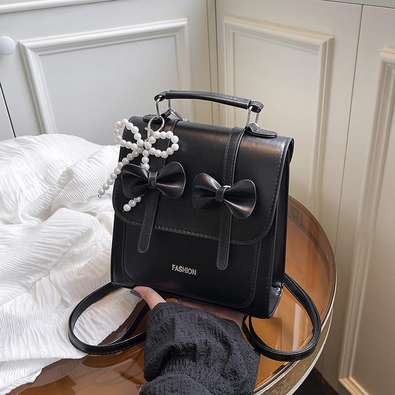 

Популярный рюкзак с бабочкой, женский новый простой повседневный рюкзак в стиле колледжа, портативный маленький рюкзак Without pendant чёрный