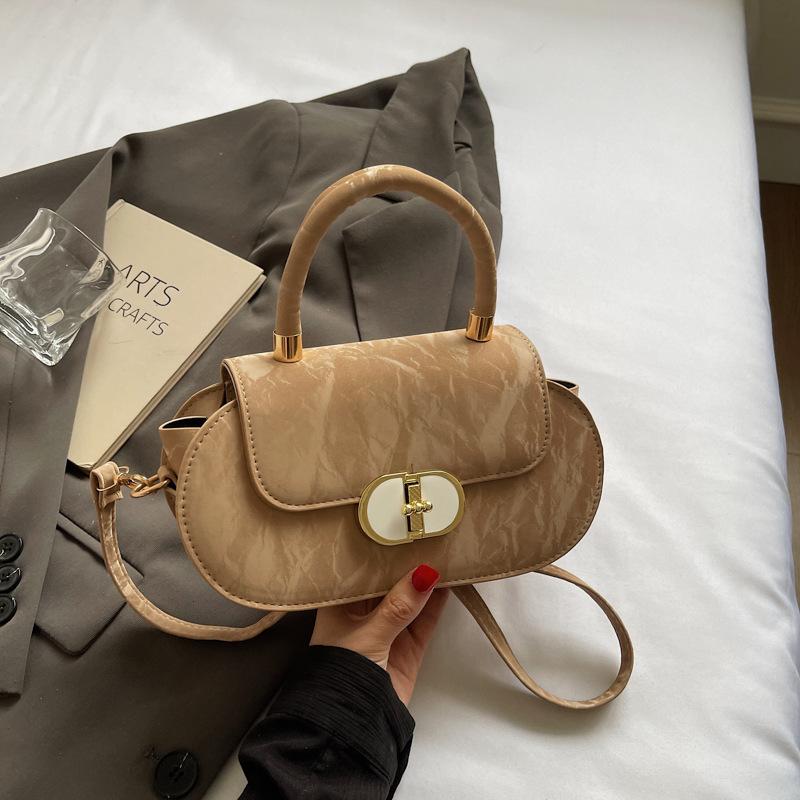 

High sense fashion portable small bag women 2025 new Korean version niche commuter bag popular versatile messenger bag хаки