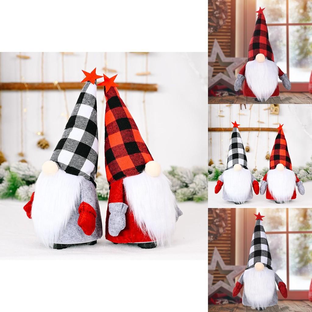 Entzückende Weihnachtsdekorationen Elektrische animierte Puppe mit rot-schwarzem kariertem Hut
