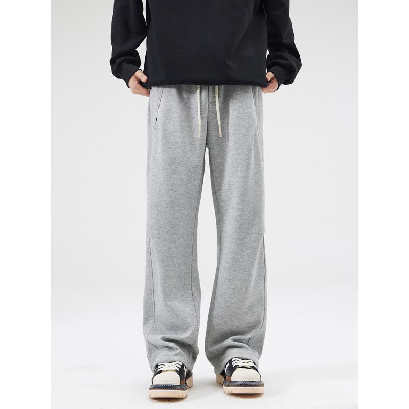 | Autumn and winter new double knee rivets irregular splicing design sweatpants American trendy brand loose drape pants