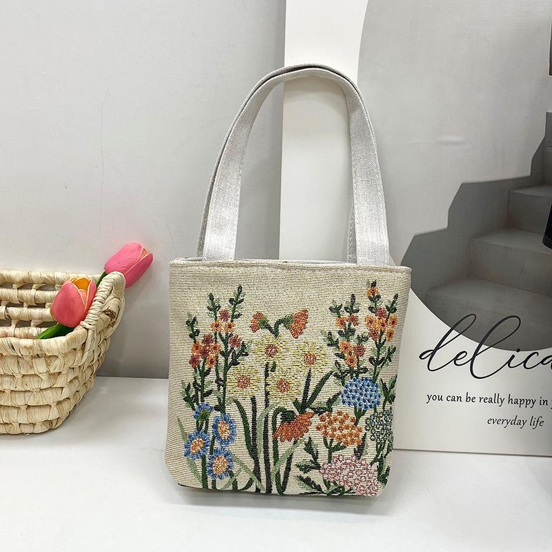 Stile etnico femminile da turismo ricamo elefante piccola borsa a mano fiore intrecciato borsa a tracolla in tela borsa per studenti quattro stagioni