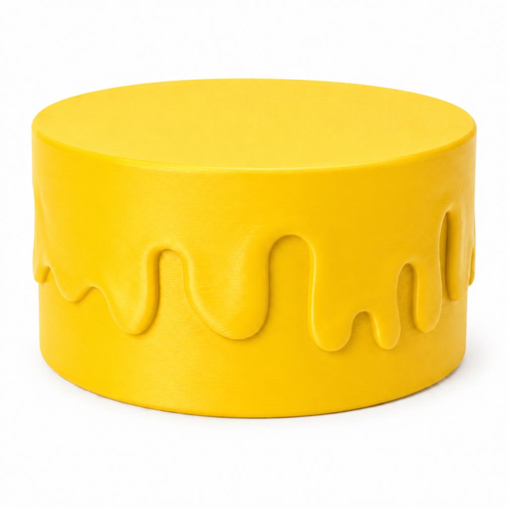 Decorative yellow container with a screw-on lid for small items