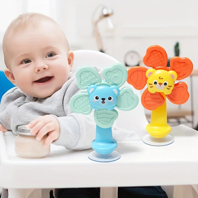 Baby Suction Cup Spinner, ABS sensory toy, portable for travel, helps develop motor and cognitive skills.