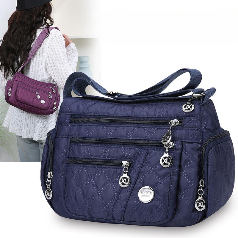 Outdoor Leisure Joker Messenger Bag Female Large Capacity Rhombic Embroidery Simple Shoulder Bag Three Layer Storage Middle Aged Handbag.