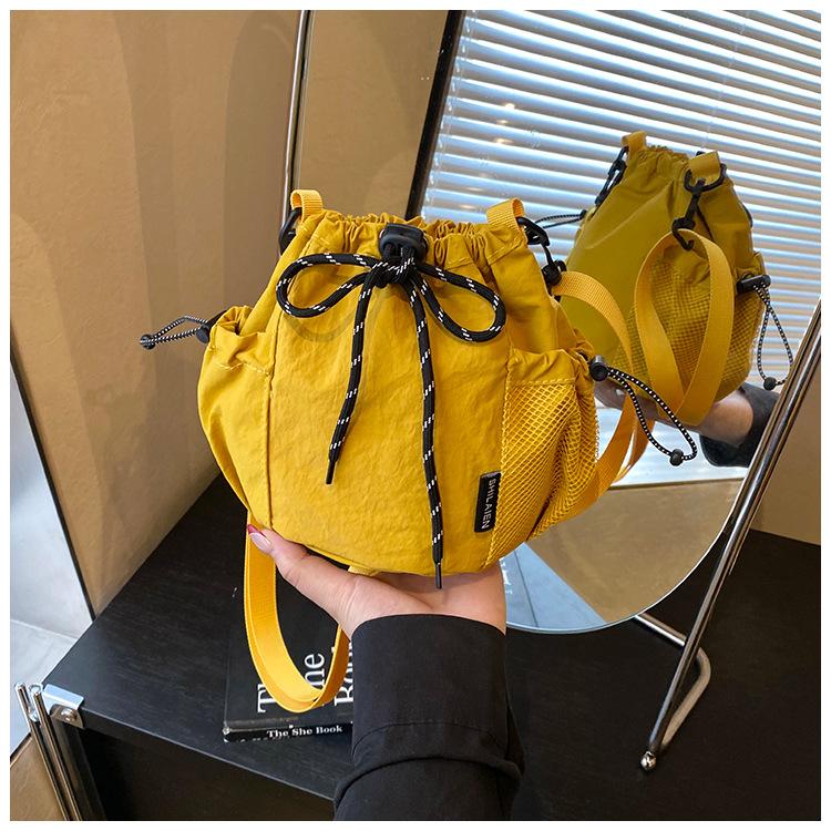 Canvas-Tasche Damen 2025 neue trendige Marke Handy-Tasche Freizeit Sport Reise Umhängetasche kleine Eimertasche