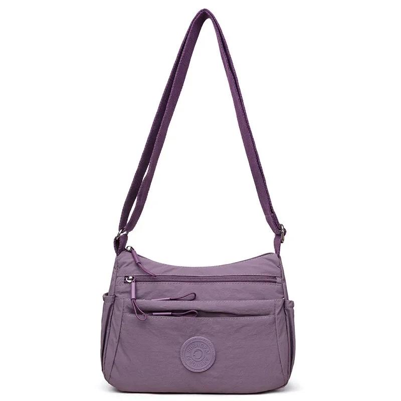 

Multi-Layer Casual Lightweight Shoulder Messenger Bag for Women Solid Color Multipocket Middle-Aged and Elderly Mother Bag фіолетовий