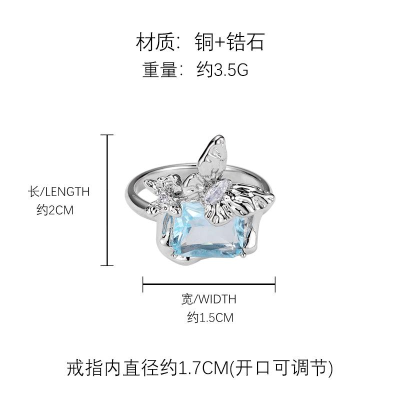 Original butterfly blue zircon ring with unique open index finger ring.