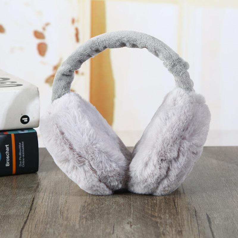 Women who sell fur, winter warm earmuffs the earmuffs on their ears the warmer the headband earmuffs