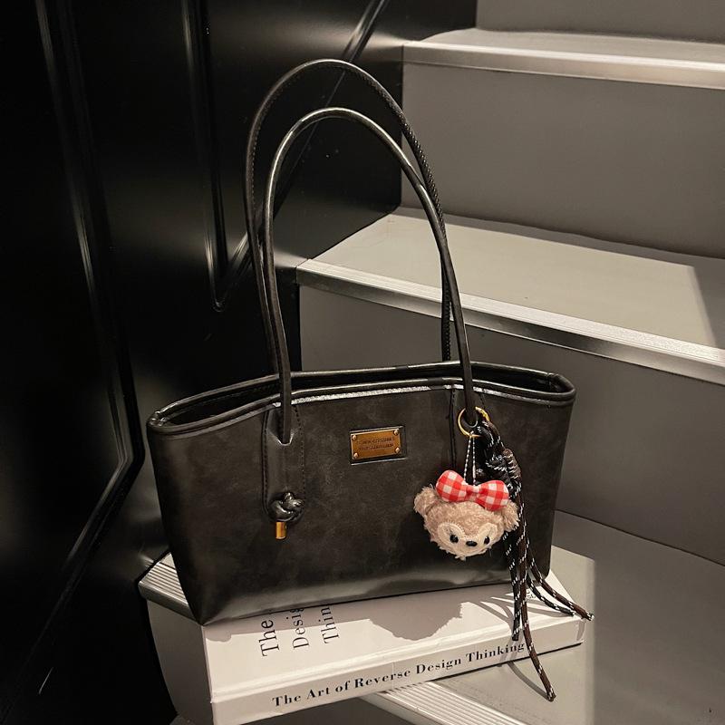 Herbst und Winter neue High-End-Textur Retro Nischen-Tasche Damen College-Studentin Pendeln Schulter-Tragetasche