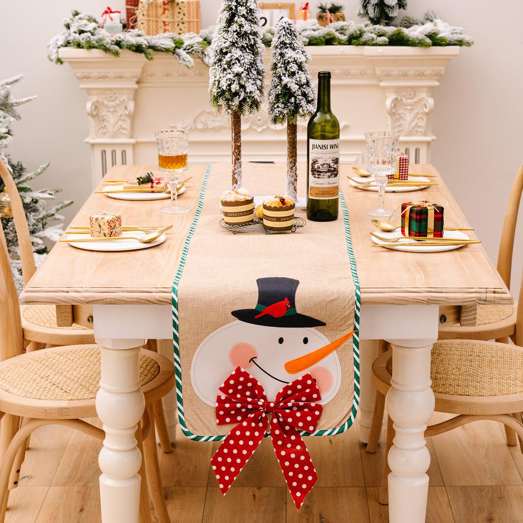 Charming Burlap Christmas Table Decor With Striped Edges Adorned With Whimsical Snowman And Characters Santa