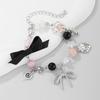 Faux Pearls Beaded Bracelet with Bowknot Pendant Butterfly Knot Charm Wristchain Adjustable Length Handchain Ornament